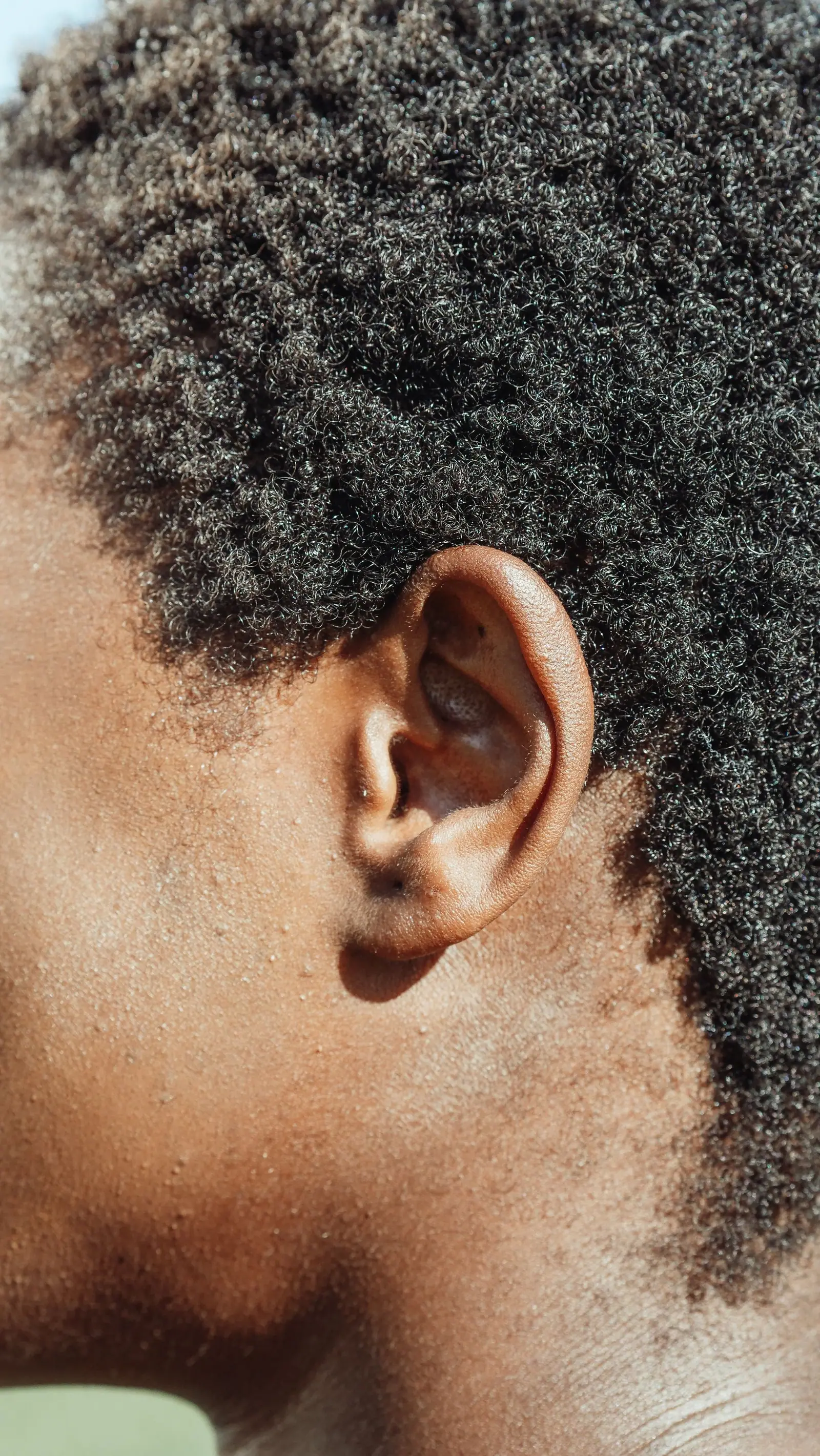 Close-up of an ear before gentle earwax removal